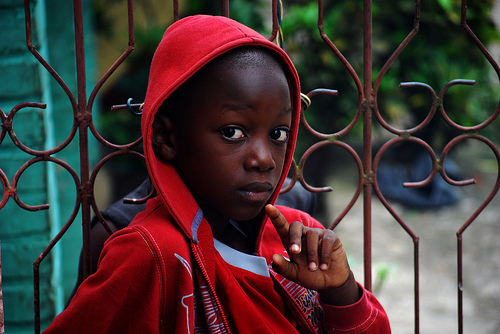 Haitian boy in red hoodie